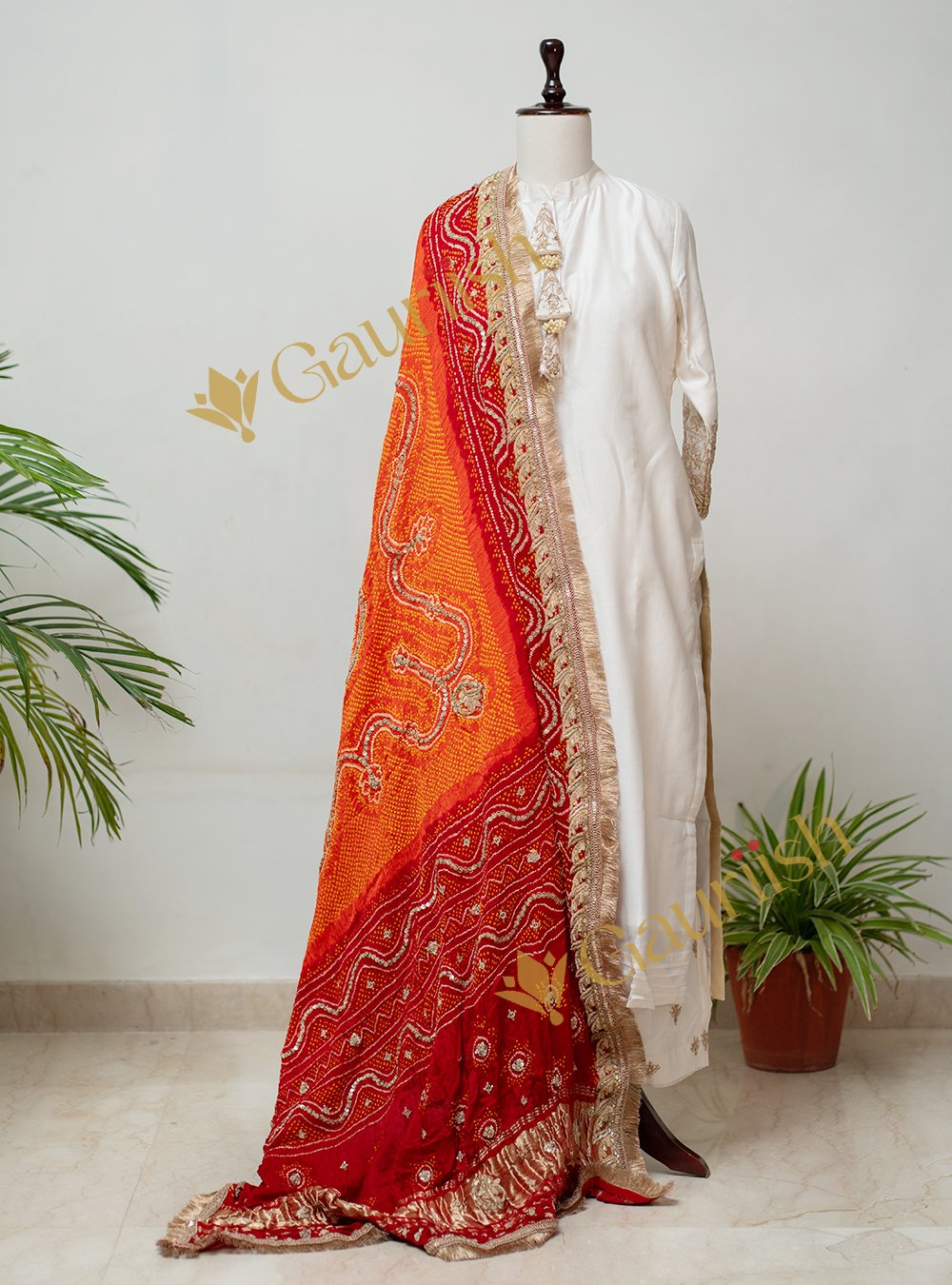 Bandhani Dupatta Kurta Set with Intricate Sleeve Detailing Bandhani Dupatta Kurta Set with Intricate Sleeve Detailing